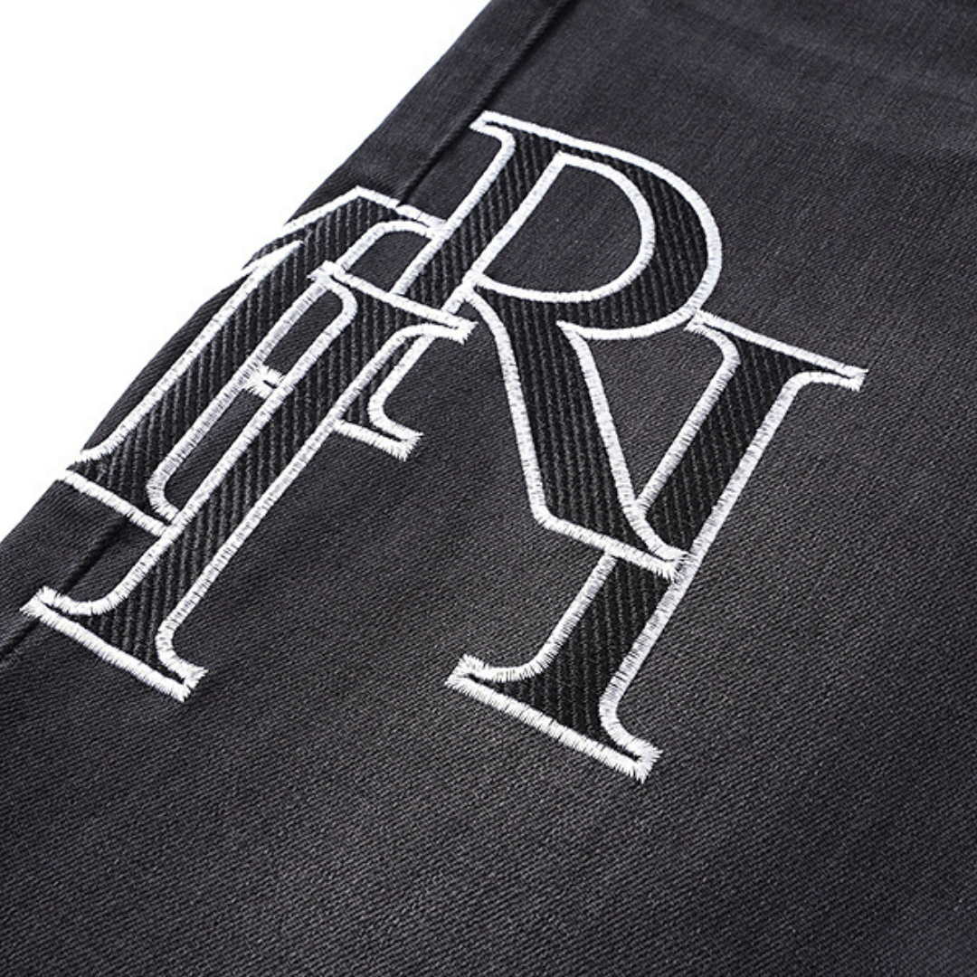 Amr Staggered Logo Jeans